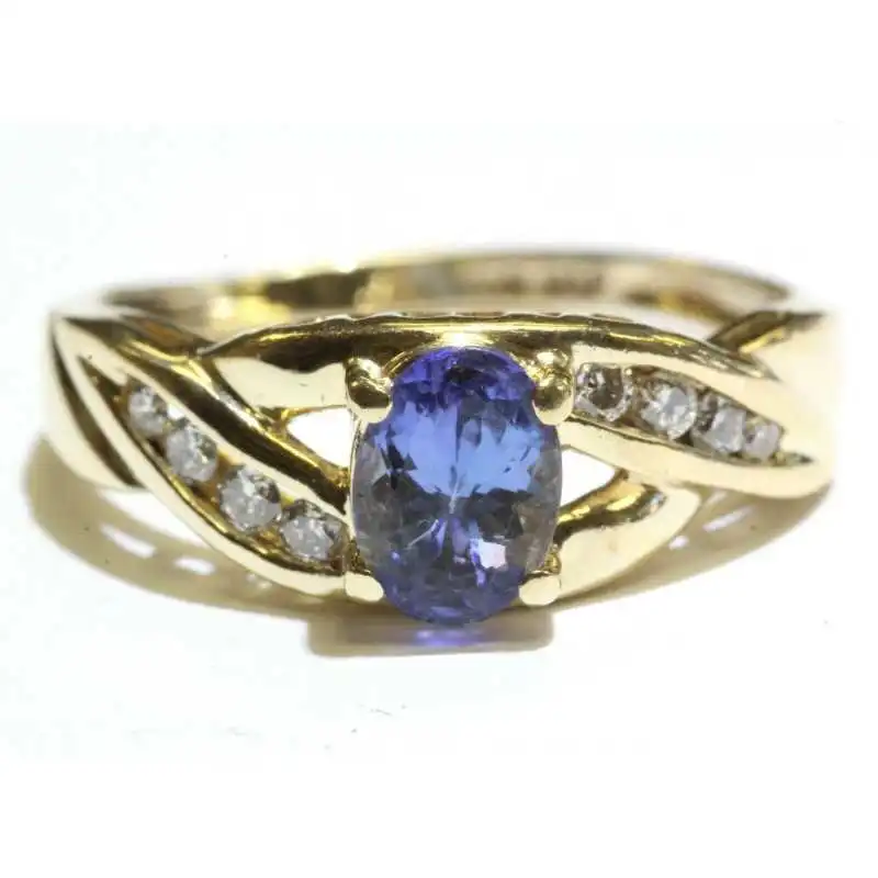 Prsten s tanzanitem a brilianty s obsahem zlata