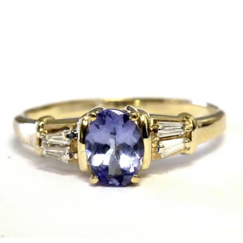 Prsten s tanzanitem a brilianty s obsahem zlata
