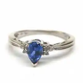 14 kt zlatý prsten safír 1 kt a brilianty 0.03 kt