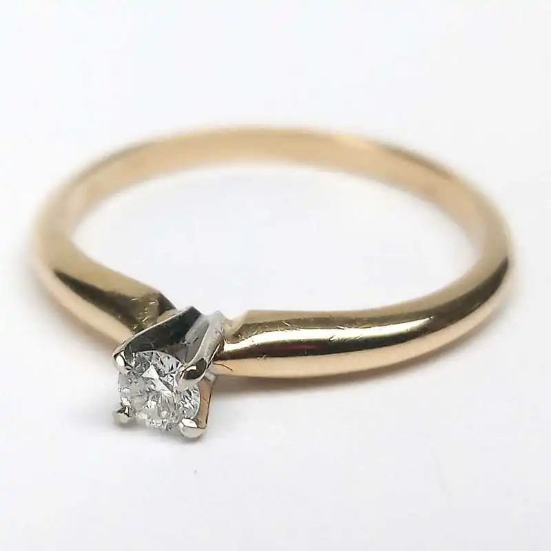 14 kt zlatý prsten s briliantem 0.10 kt