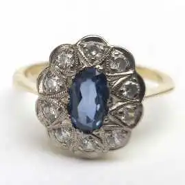 14 kt zlatý prsten se safírem a zirkony