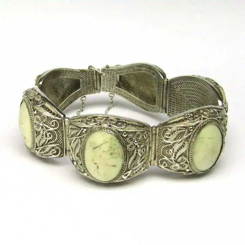 Stříbrný náramek vykládaný slonovinou