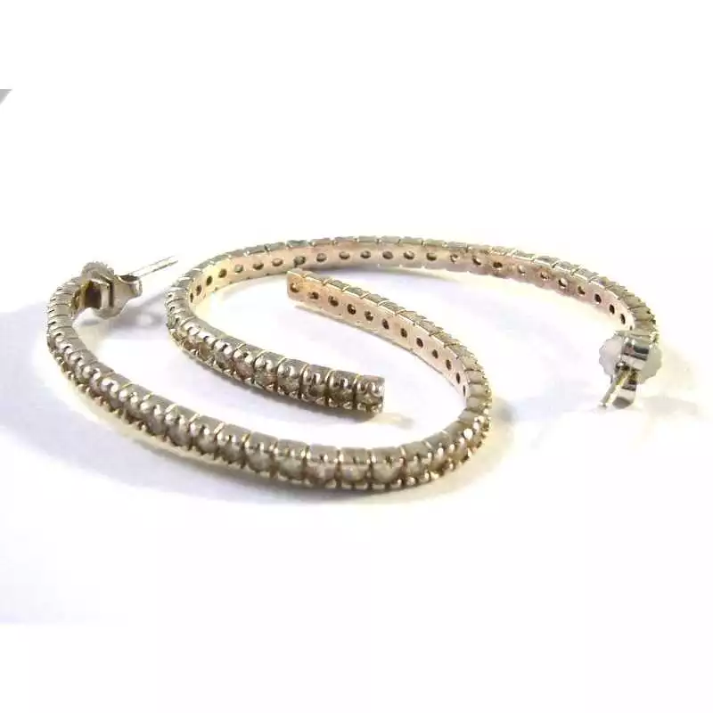 Stříbrné naušnice s bílými topazy