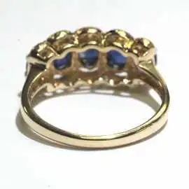 14 kt zlatý prsten se safíry